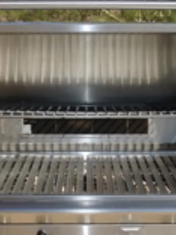 The same grill with clean grates and stainless after a deep clean