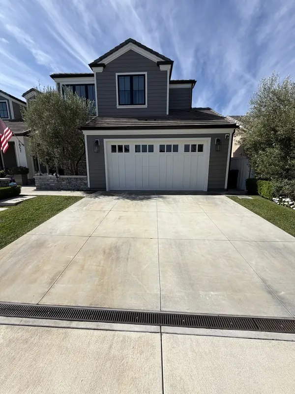 The same driveway even and bright after surface cleaning