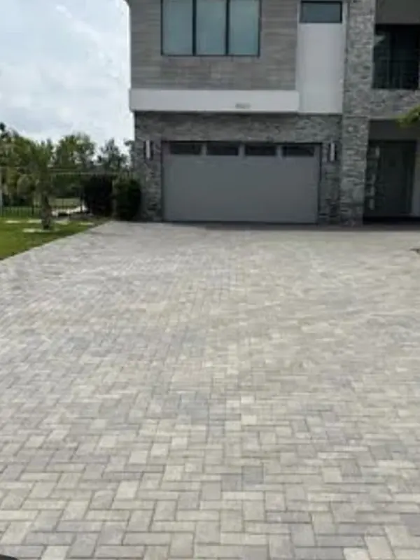 Paver driveway gray and dull before cleaning