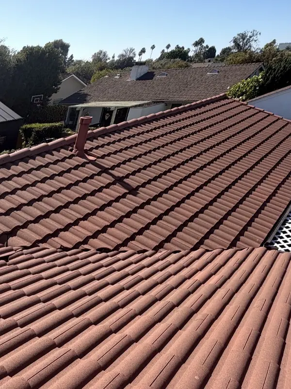 The same red clay tile roof bright and even after a soft wash