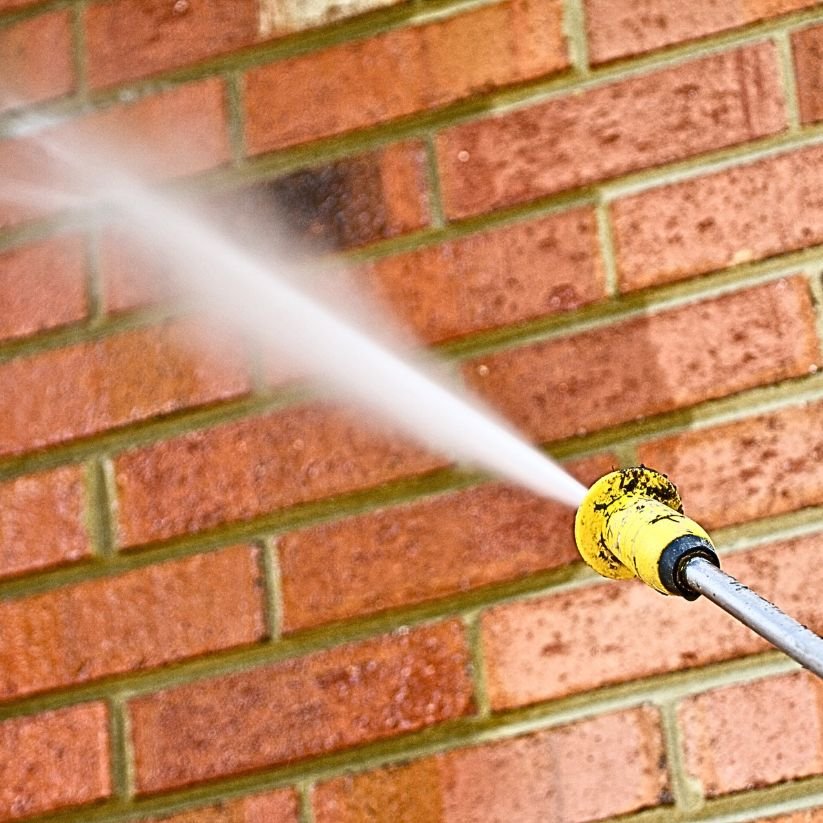Titan Exterior Cleaning in Orange County cleaning a commercial building