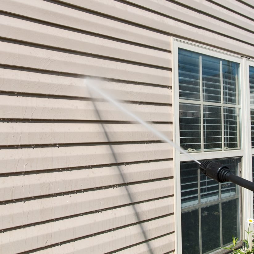 Titan Exterior Cleaning using soft wash method on vinyl siding
